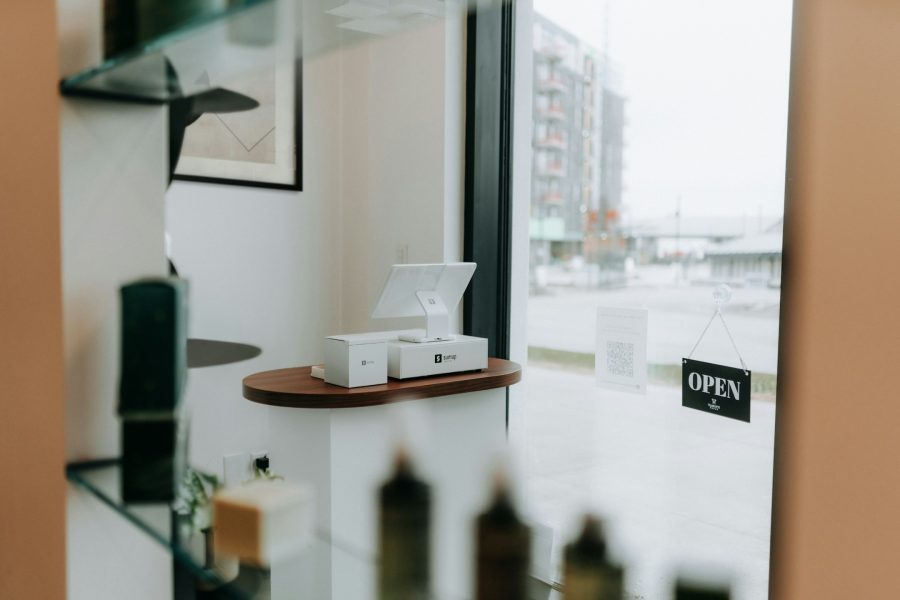 A modern retail display with commercial touchscreen in use