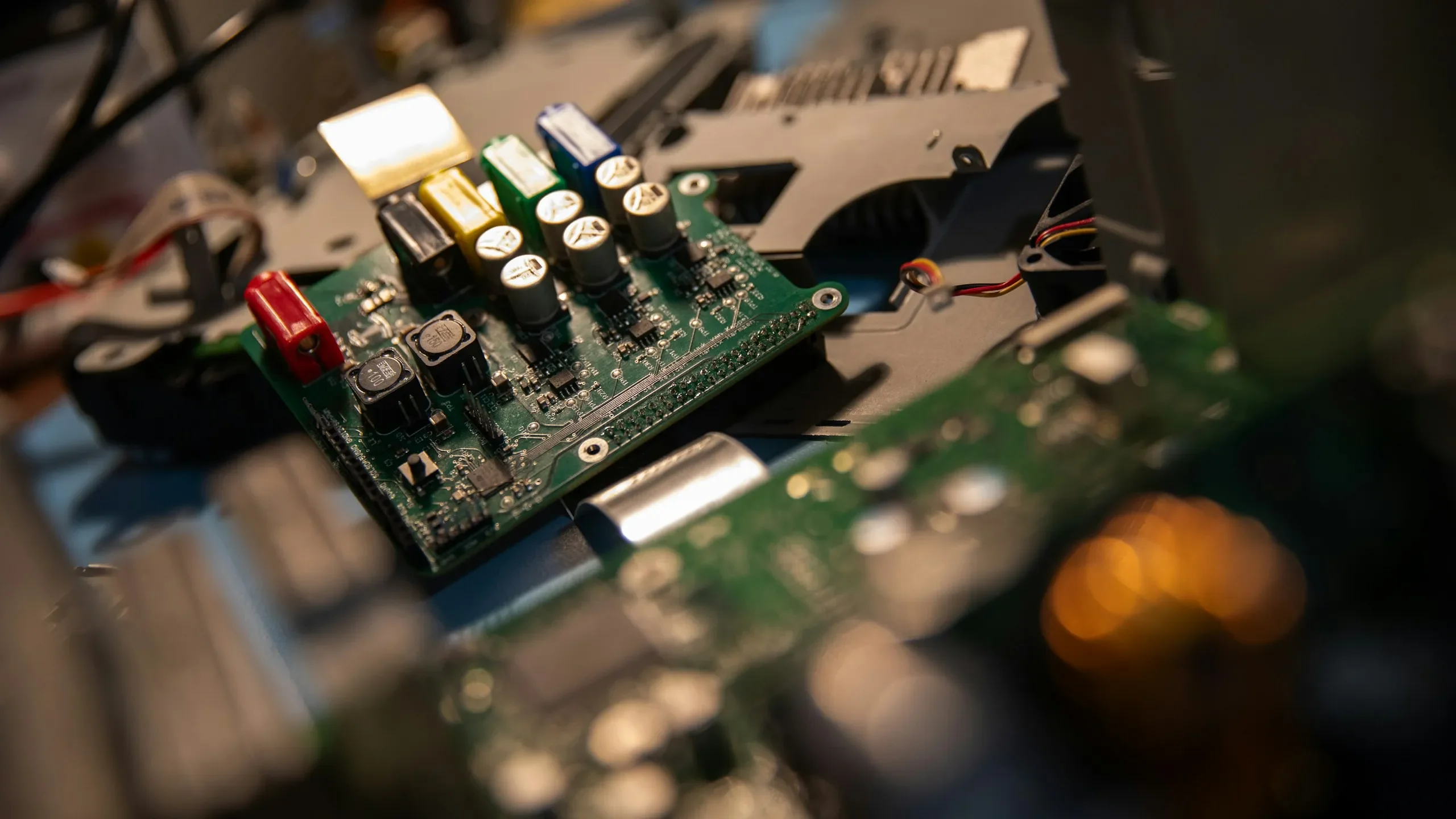 A close up of a computer motherboard with many wires